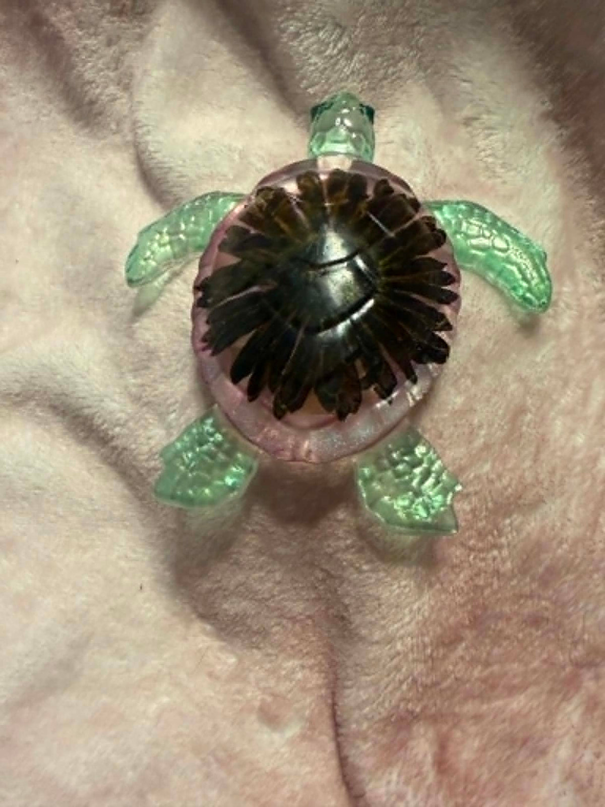 Sea Turtle Figurine with a Black-Eyed Susan