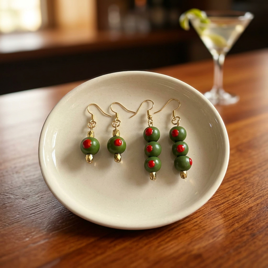 Both single-olive and three-olive earring pairs styled together